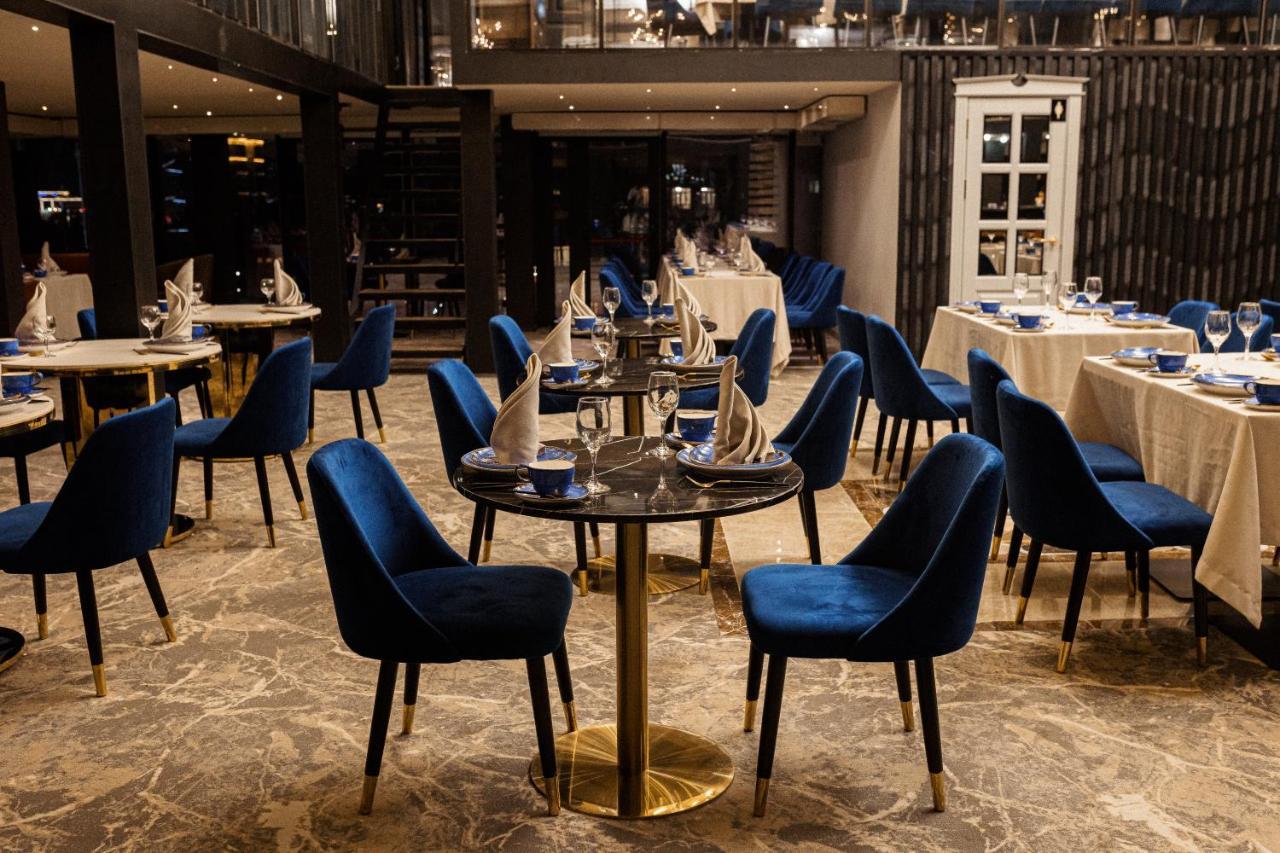 Orient Hotel Bishkek Bagian luar foto
