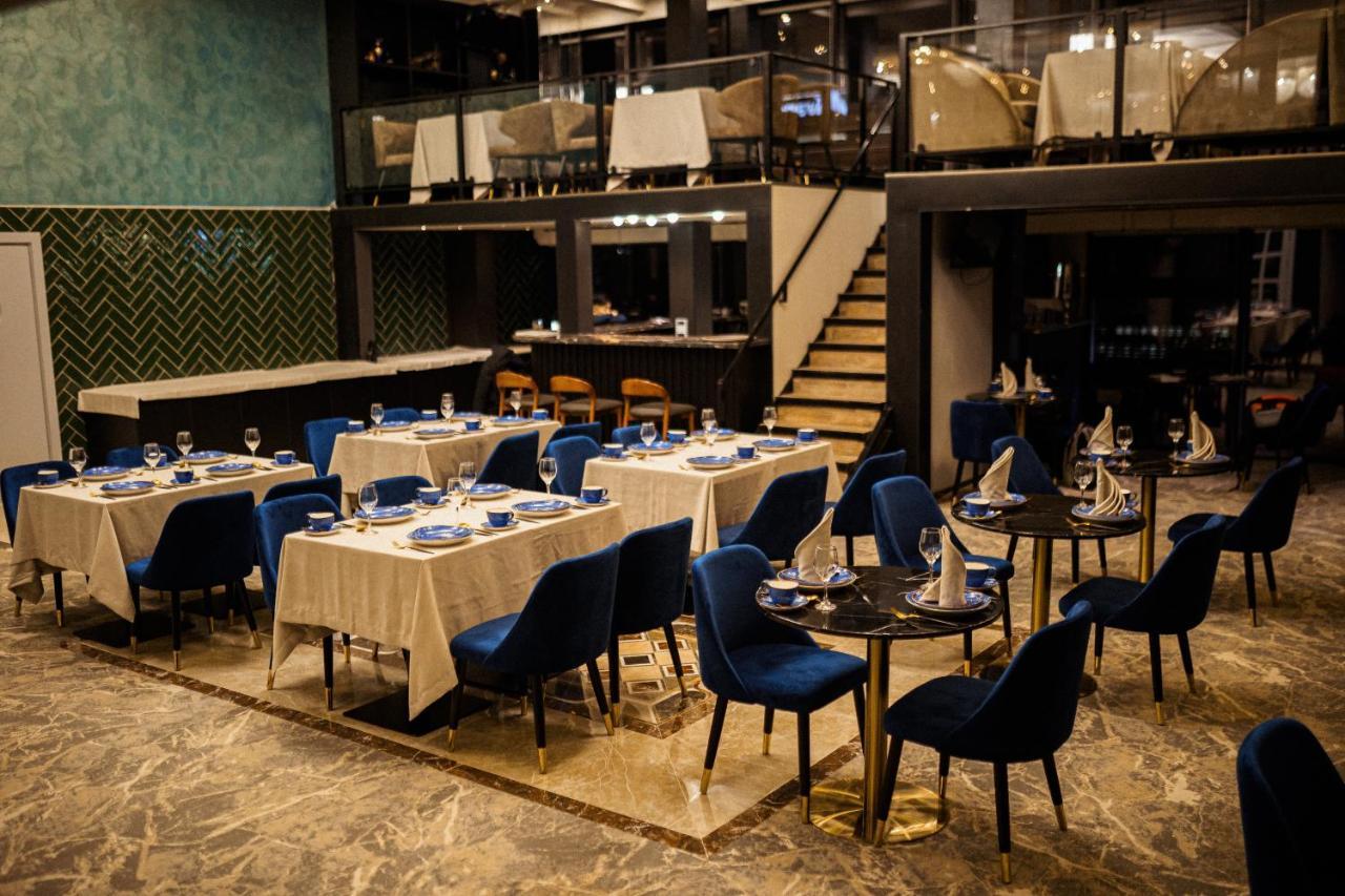 Orient Hotel Bishkek Bagian luar foto